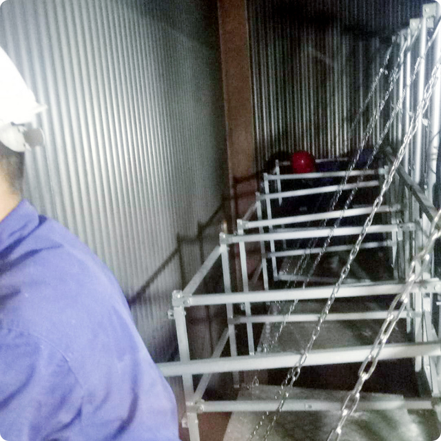 Suspended boiler access platform for safe furnace repair work